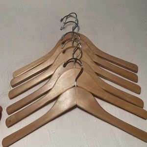 Six wooden kids hangers